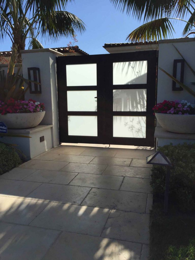 Contemporary wood & glass dual sliding gate